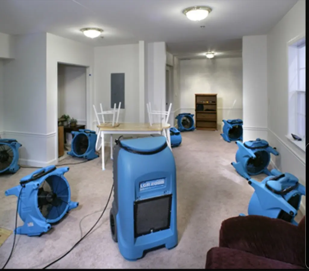Air movers and dehumidifier setup for Water Damage Restoration in West Deer